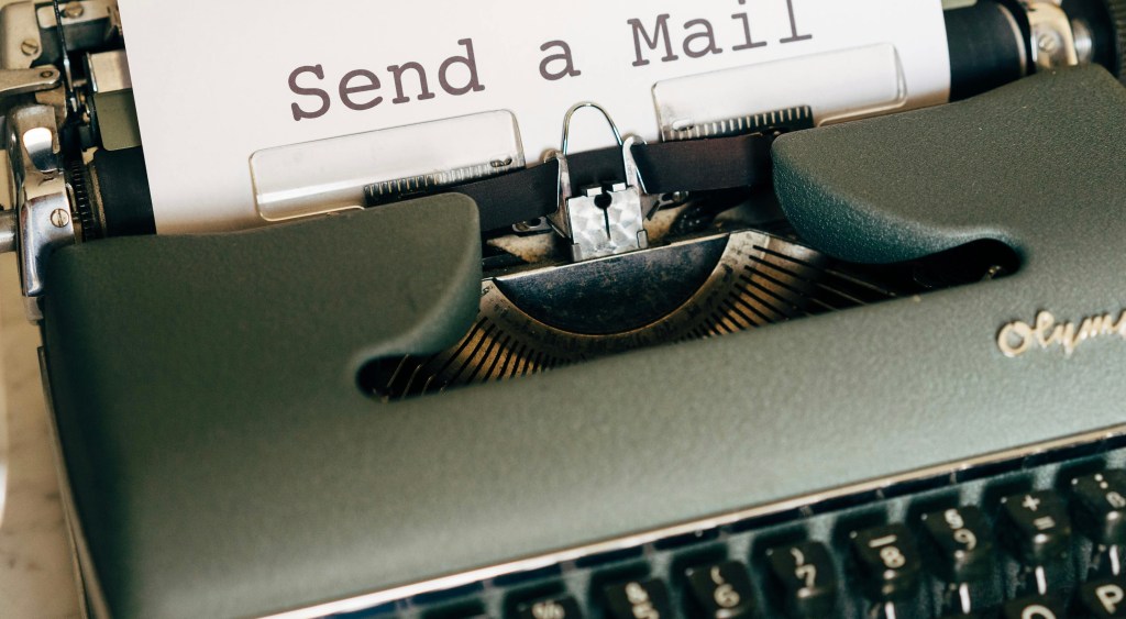 Vintage typewriter with paper reading "Send a Mail" – contact me page illustration for Bananas Mode On blog